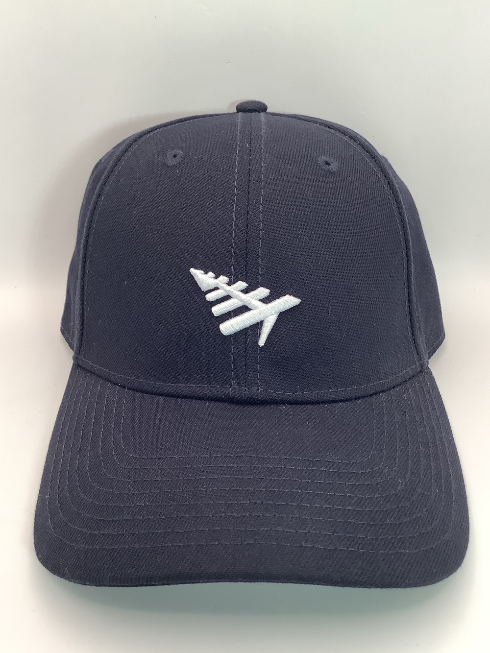 Paper Planes navy blue dad cap with leather strap. New with tags